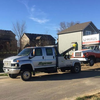 Uhaul Truck Being Towed